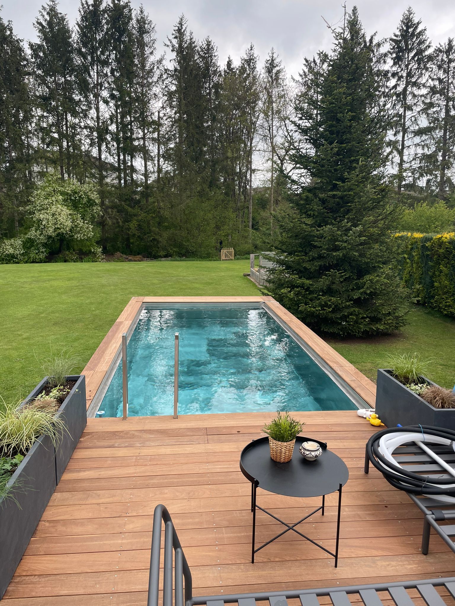 white concrete building with swimming pool